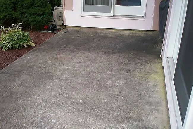 Concrete-Patio-Cleaning-BEFORE-ic-webp