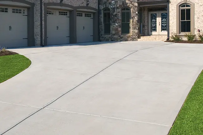 The same residential concrete driveway looking completely clean after a professional pressure washing service service in Greenville, Wisconsin.